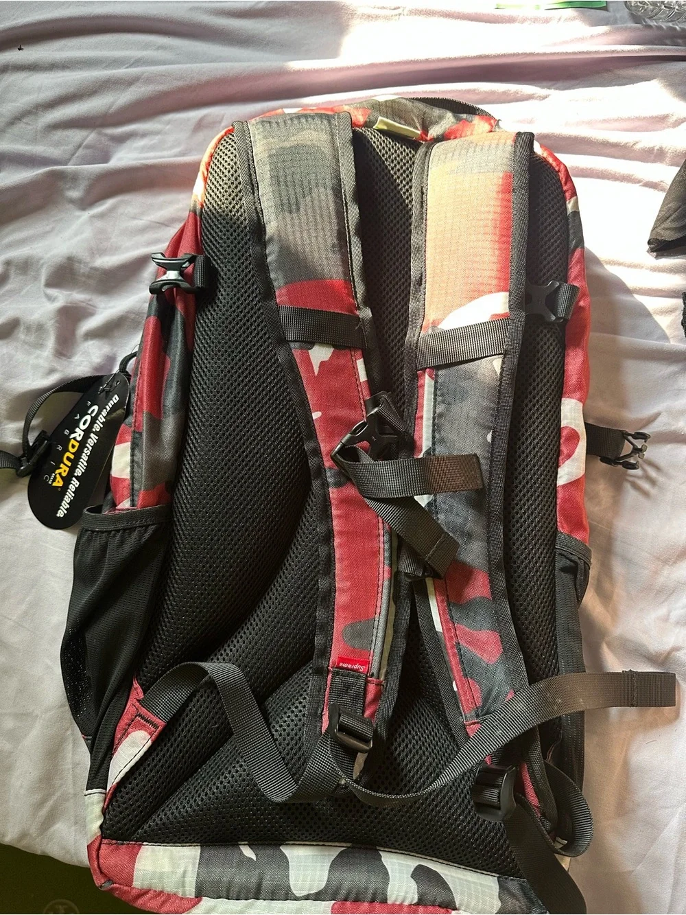 Supreme Red Camo Backpack - Men’s Streetwear Bag